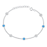 Sterling Silver Rhodium Plated Station Round Clear CZ And Blue Lab Opal Bracelet