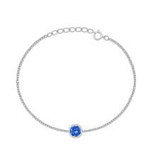 Load image into Gallery viewer, Sterling Silver Rhodium Plated Round Blue Topaz CZ Solitaire Bracelet