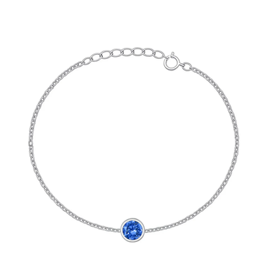 Sterling Silver Rhodium Plated Round Blue Topaz CZ Solitaire Bracelet