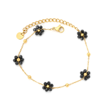 Load image into Gallery viewer, Stelluxe Stainless Steel Gold Color PVD Black Flower And Bead Cross Chain Bracelet