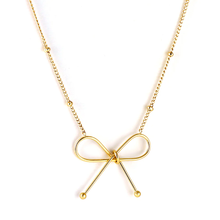 Load image into Gallery viewer, Tresoli Stainless Steel Gold Color PVD Bow Pendant Necklace