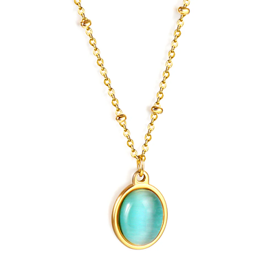Tresoli Stainless Steel Gold Color PVD Long Round Bead And Oval Blue CZ Pendant Necklace