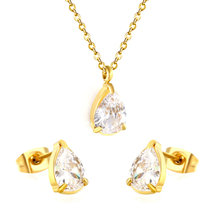 Load image into Gallery viewer, Tresoli Stainless Steel Gold Color PVD Teardrop Cubic Zirconia Cross Chain Jewelry Set