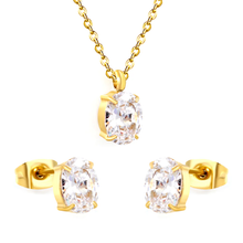 Load image into Gallery viewer, Tresoli Stainless Steel Gold Color PVD Oval Cubic Zirconia Cross Chain Jewelry Set