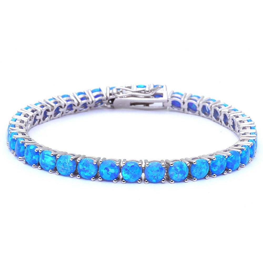 Sterling Silver 14.5CT 4 Prong Blue Fire Opal BraceletAnd Length 8inchAnd Width 5mmAnd Thickness 1mm