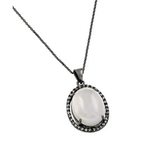 Load image into Gallery viewer, Sterling Silver Black Rhodium Plated Necklace with Centered Oval White Stone and Halo Set with Clear Czs PendantAnd Chain Length of 18  AdjustableAnd Pendant Dimensions: 25.8MMx18MM