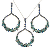 Sterling Silver Rhodium Plated Dangling Round Pendant with Teal Blue CZ