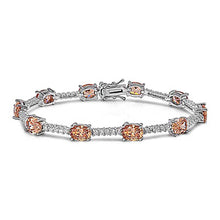 Load image into Gallery viewer, Sterling Silver Elegant Bracelet Oval Prong Set with Champagne Cz and Five Round Clear Czs in BetweenAnd Length of 7.5  Stone Size: 7x5MM