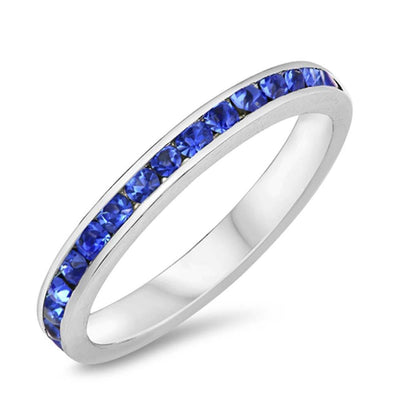 Sterling Silver Eternity Band Ring with Blue Sapphire Crystals on Channel Setting with Rhodium FinishAnd Band Width 3MM