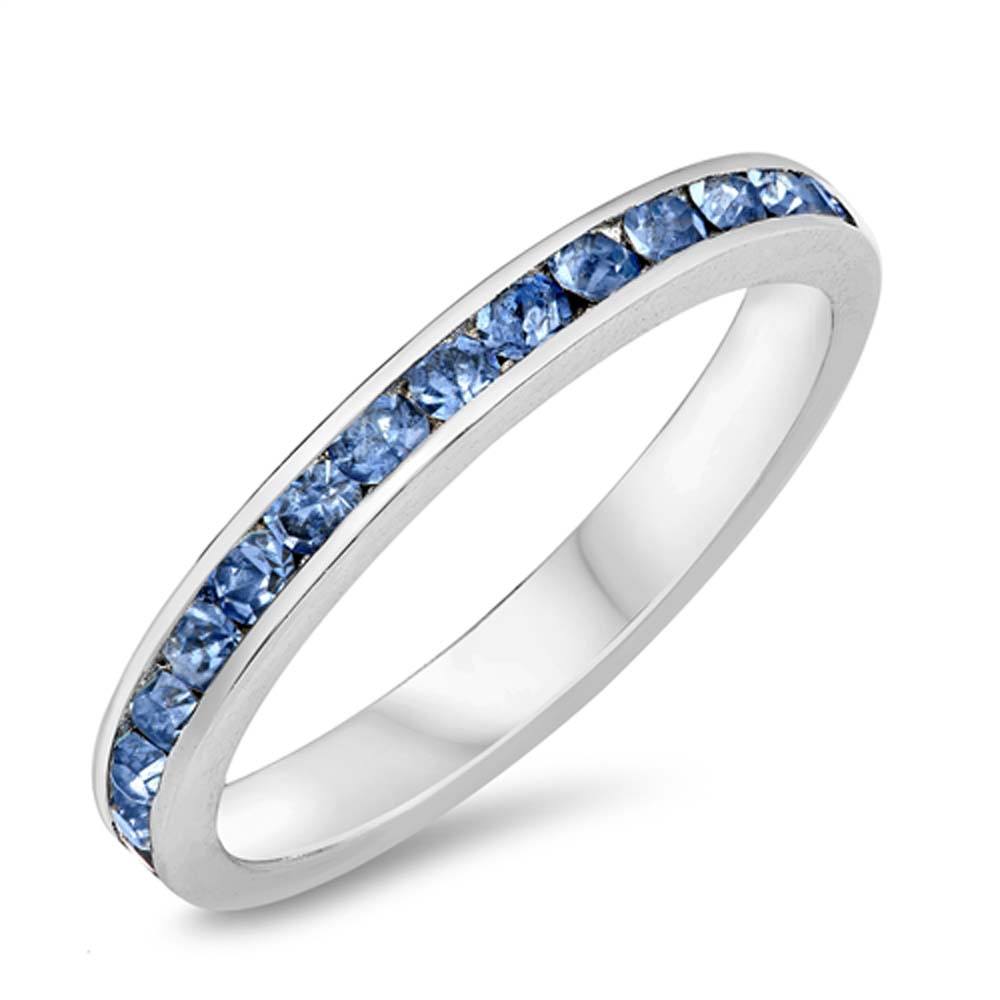 Sterling Silver Eternity Band Ring with Blue Topaz Crystals on Channel Setting with Rhodium FinishAnd Band Width 3MM
