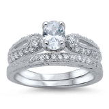 Sterling Silver Pave Set Clear CZ Fancy 2 Piece Engagement Ring Set with a 4 Prong Set Oval Cut Clear CZ in the CenterAnd Ring Face Height of 9MM and Ring Band Width of 3MM