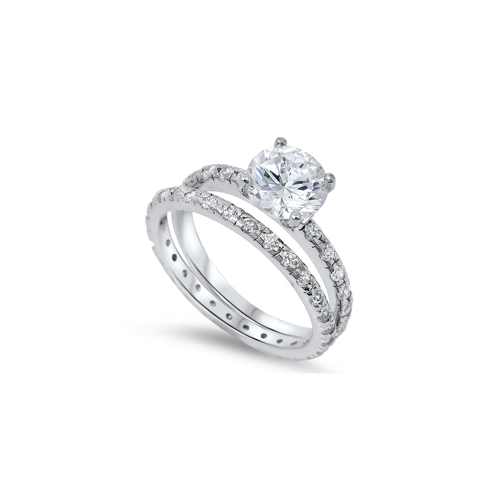 Sterling Silver Bridal Set Eternity Band with Pave Simulated Diamond and Centered Clear Round Solitaire Simulated Diamond on 4 Prong SettingAnd Band Width of 4MM and Face Height of 7MM