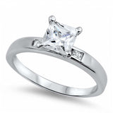Sterling Silver Princess Cut Clear Solitaire CZ Engagement Ring on Prong Setting with Small Channel Setting Side View CZ with Rhodium Finish, Face Height of 7mm