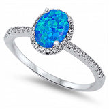 Rhodium Plated Sterling Silver Clear Cz Ring with Oval Blue Lab Opal in the CenterAnd Ring Face Height of 10MM