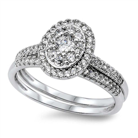 Sterling Silver Elegant 2-Pieces Engagement Ring Inlaid with Clear Czs and Centered Paved Oval Shaped DesignAnd Band Width of 2MM