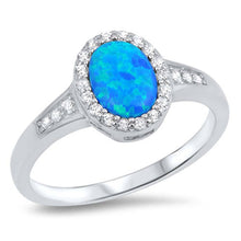 Load image into Gallery viewer, Sterling Silver Ring with Oval Blue Lab Opal Center and Clear CZsAnd Face Height of 11 mm