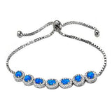 Sterling Silver Simulated Blue Opal Adjustable Halo Rhodium Bracelet